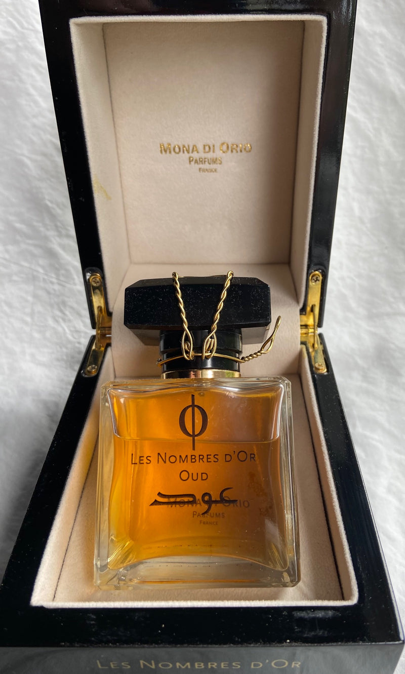 Perfume bottle with gold cap and &